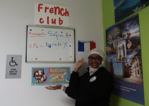 President of the French Club, Safia Ali ‘25 showing off the French Club board.