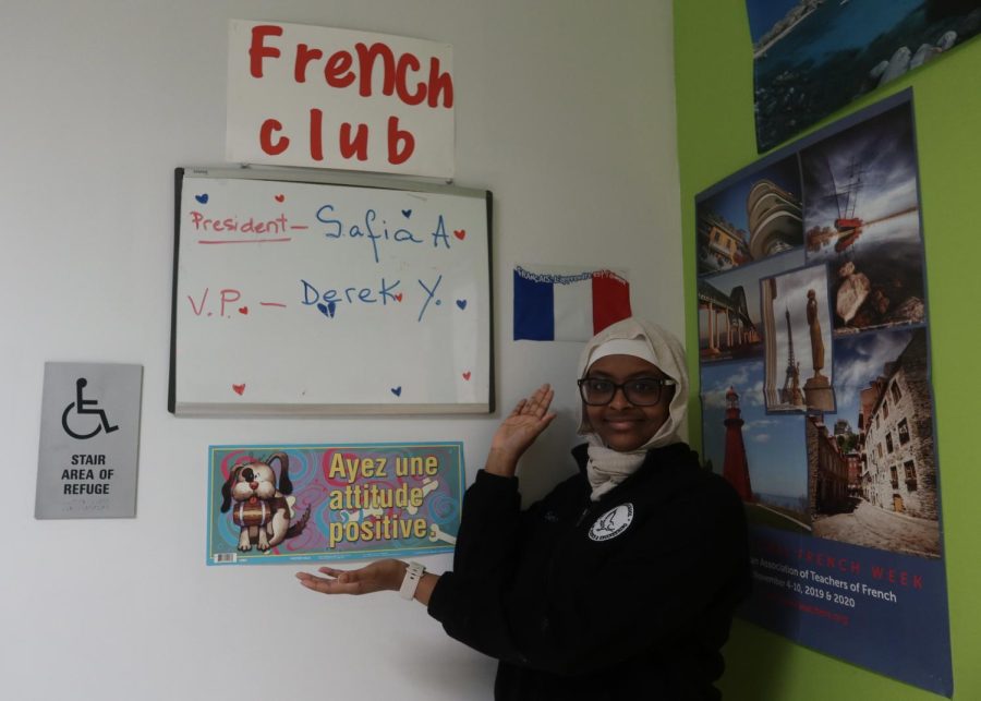 President+of+the+French+Club%2C+Safia+Ali+%E2%80%9825+showing+off+the+French+Club+board.