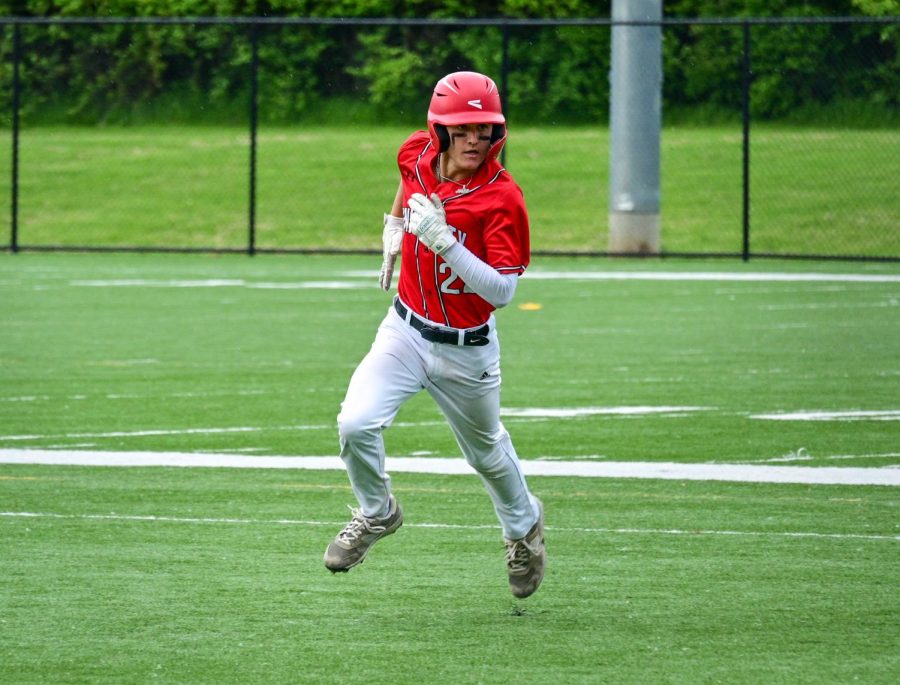 Third baseman Jackson Marchetti '25 on the bases against Prince Tech.