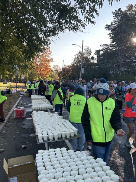 Hartford Marathon Draws 19,000 Participants, University High School Volunteers Step Up to Serve Water