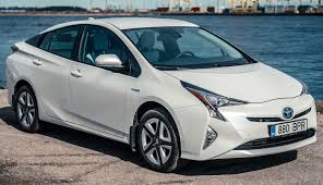 Priuses are hybrid cars which allow for greenhouse gas emissions to be reduced the same way that electric cars do. 